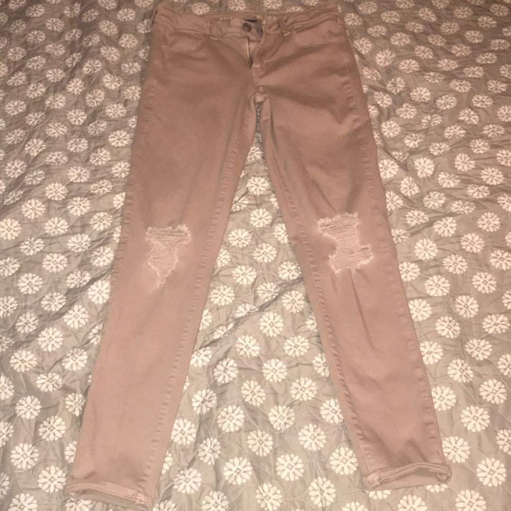 Light pink, ripped, American eagle jeggings